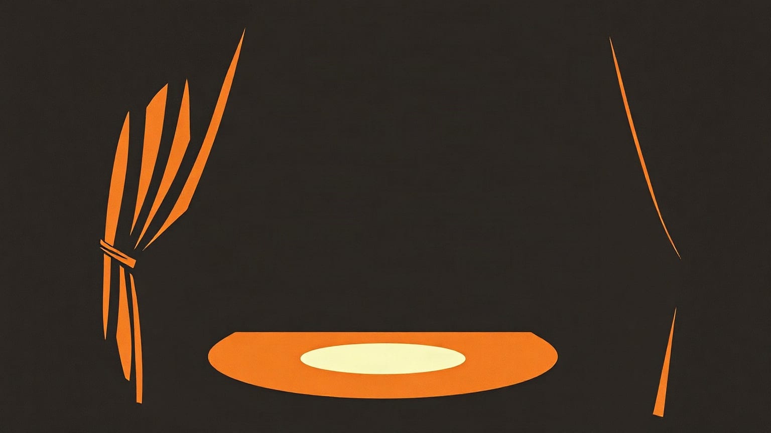 A tied-back paper drape and a single lit spot on an empty stage