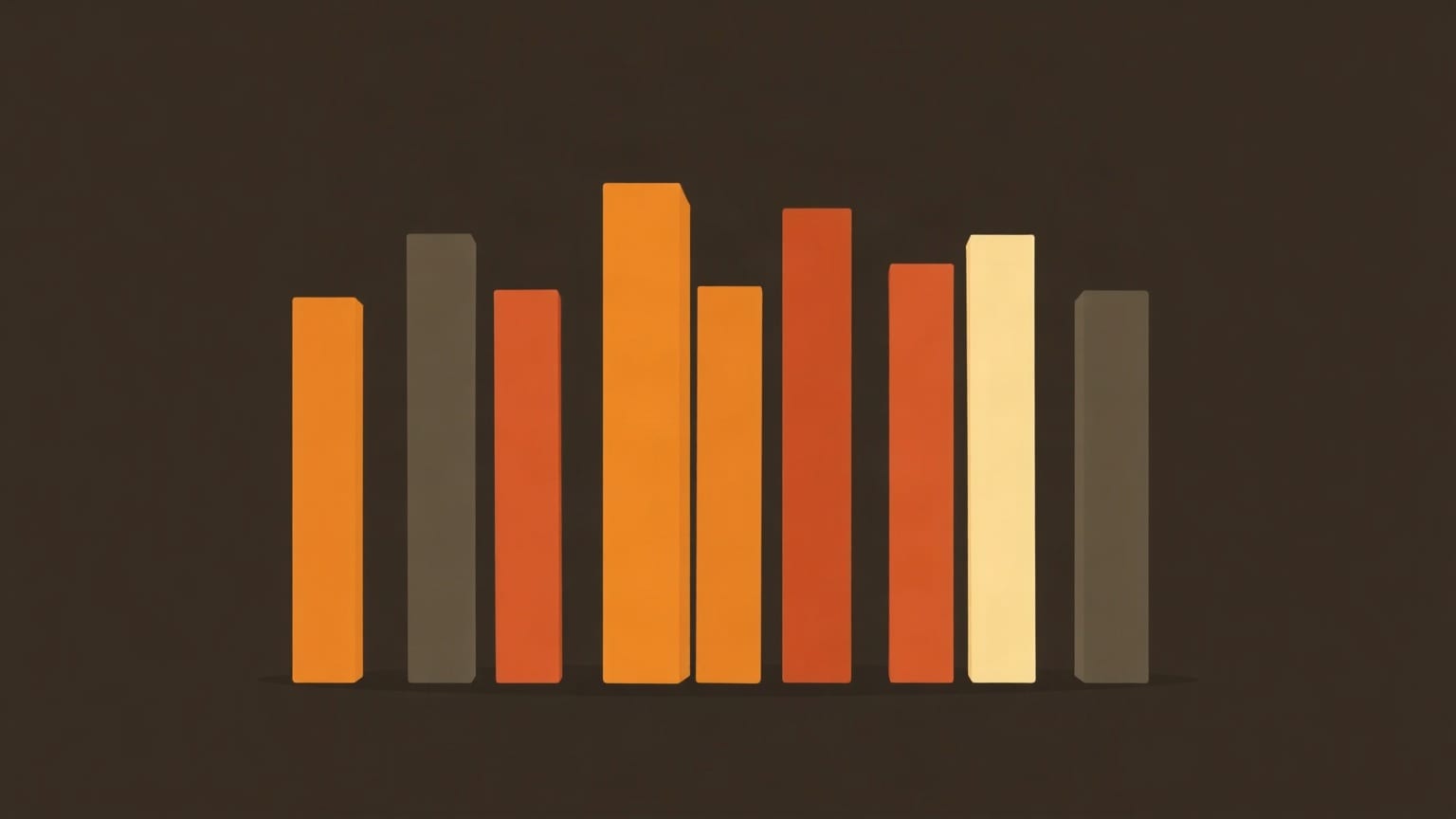 A close row of book blocks in orange, red, cream and grey on charcoal brown, their tops uneven