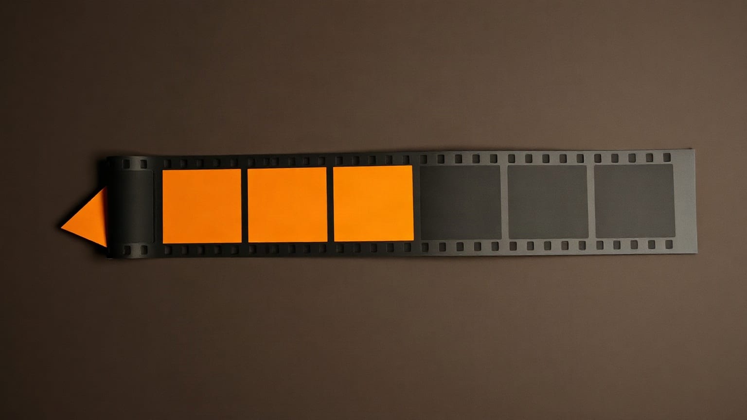A paper film strip crossing the frame, five frames in brighter tones, a projector beam at the edge